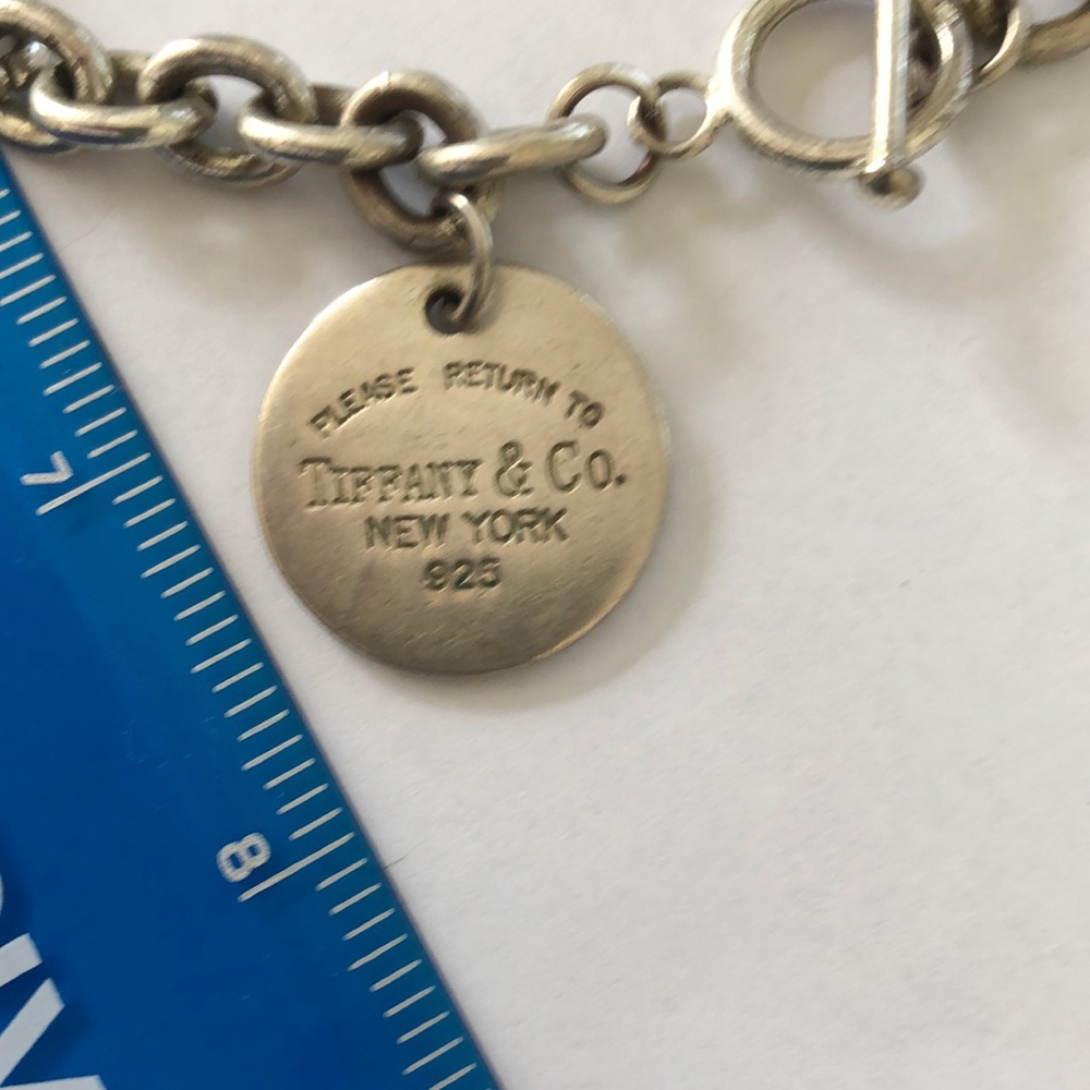Marked Tiffany and Co., 16”chain /pendent
